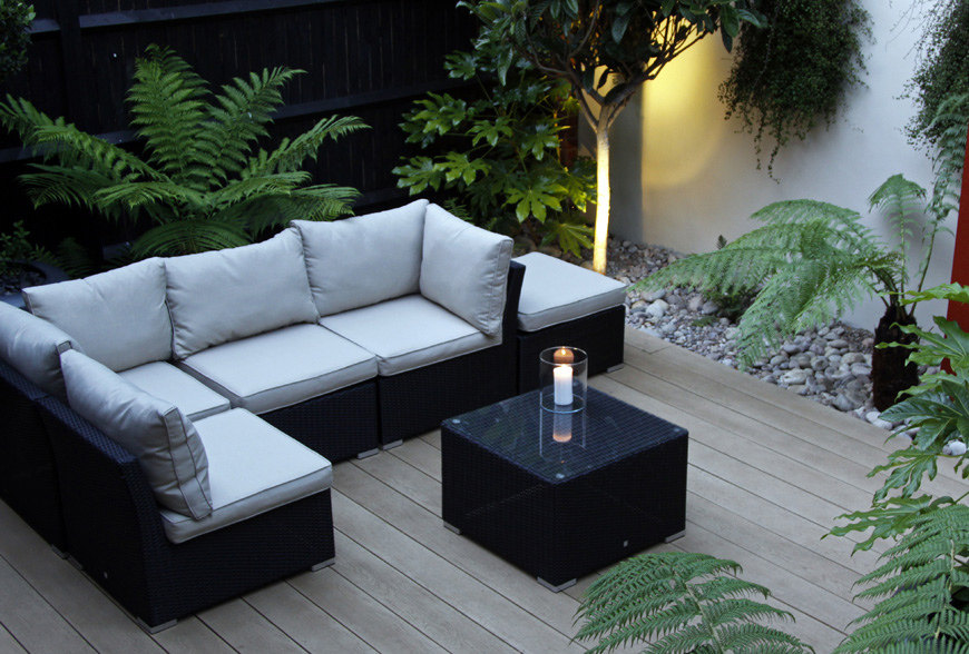 millboard decking used by greencube garden design in this modern garden design in caterham, surrey